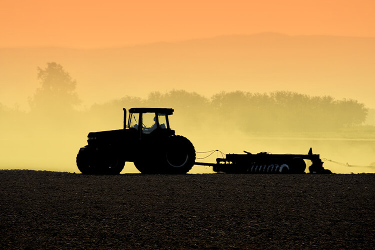 Tractor with Tillage Disc Attachment